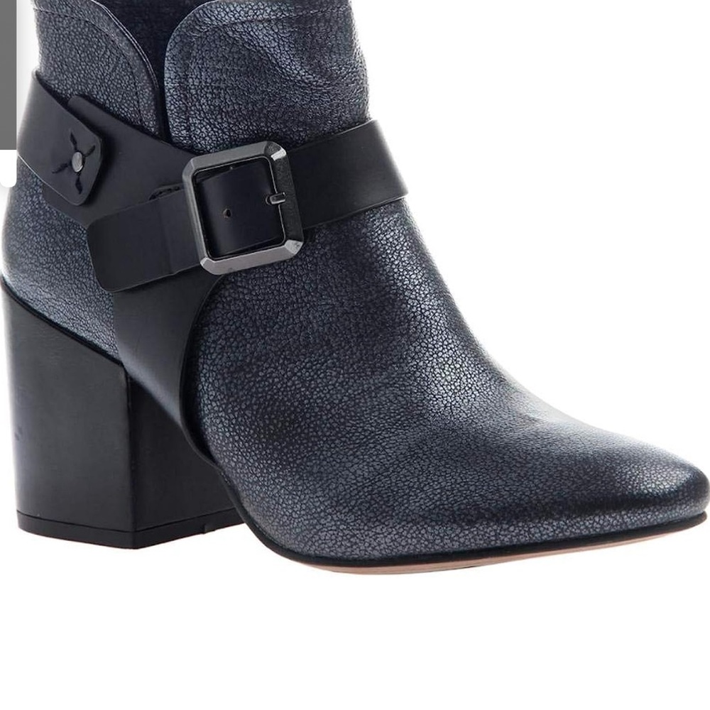 Buckled leather ankle boots